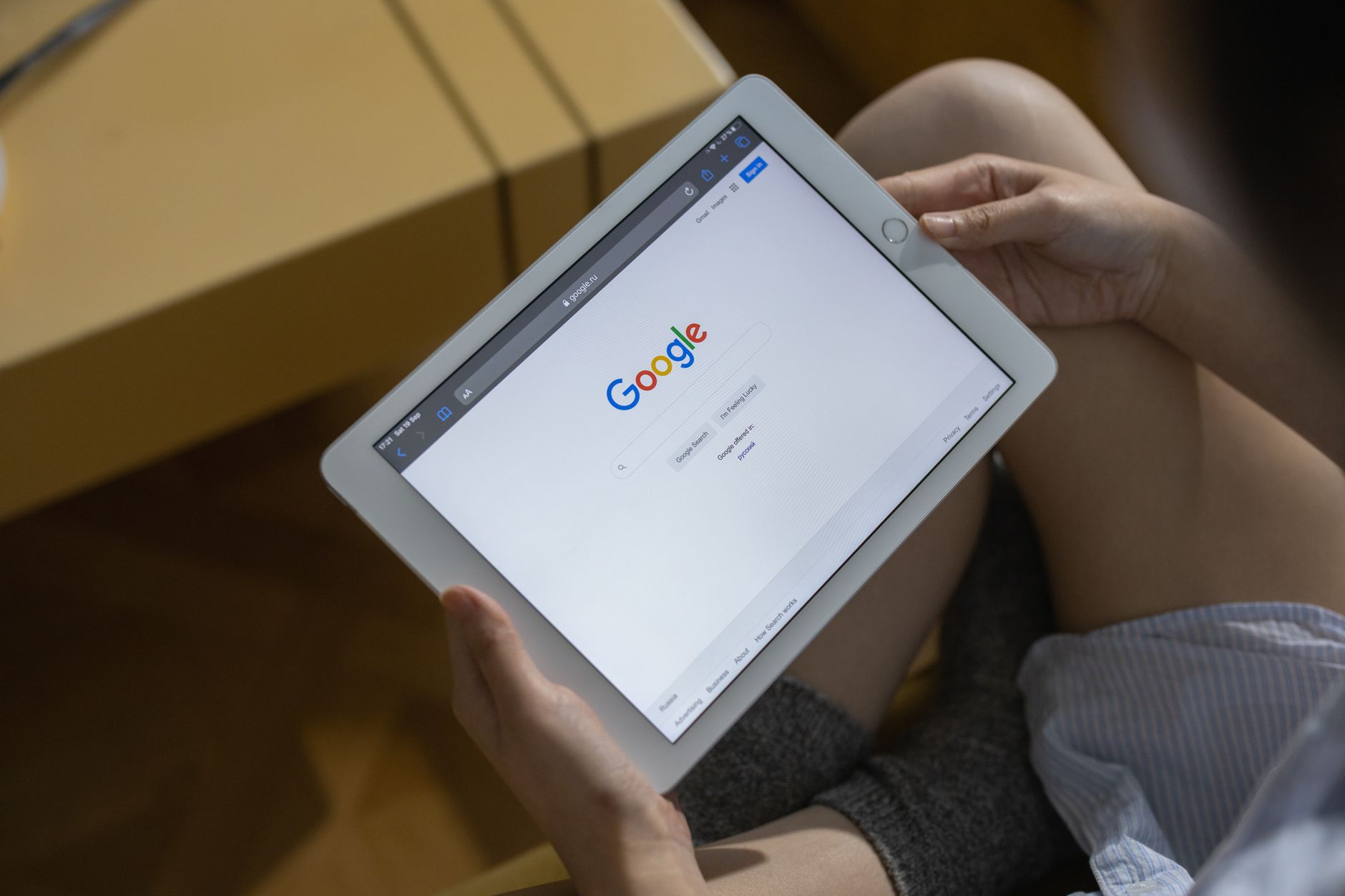 Business owner using Google review response templates on a laptop to improve local SEO rankings in 2026