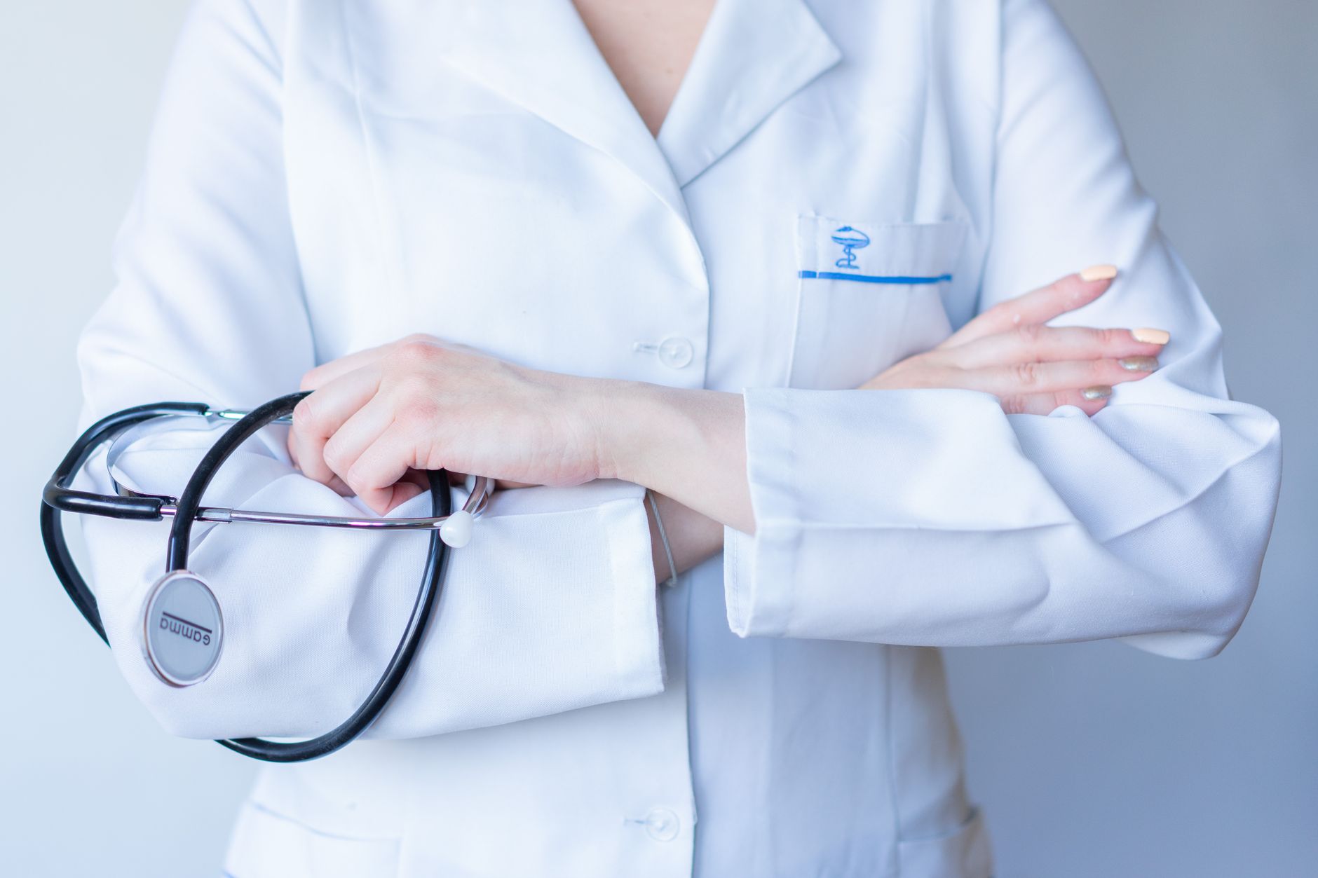 Doctor reviewing GBP for healthcare providers on a laptop in a modern medical office